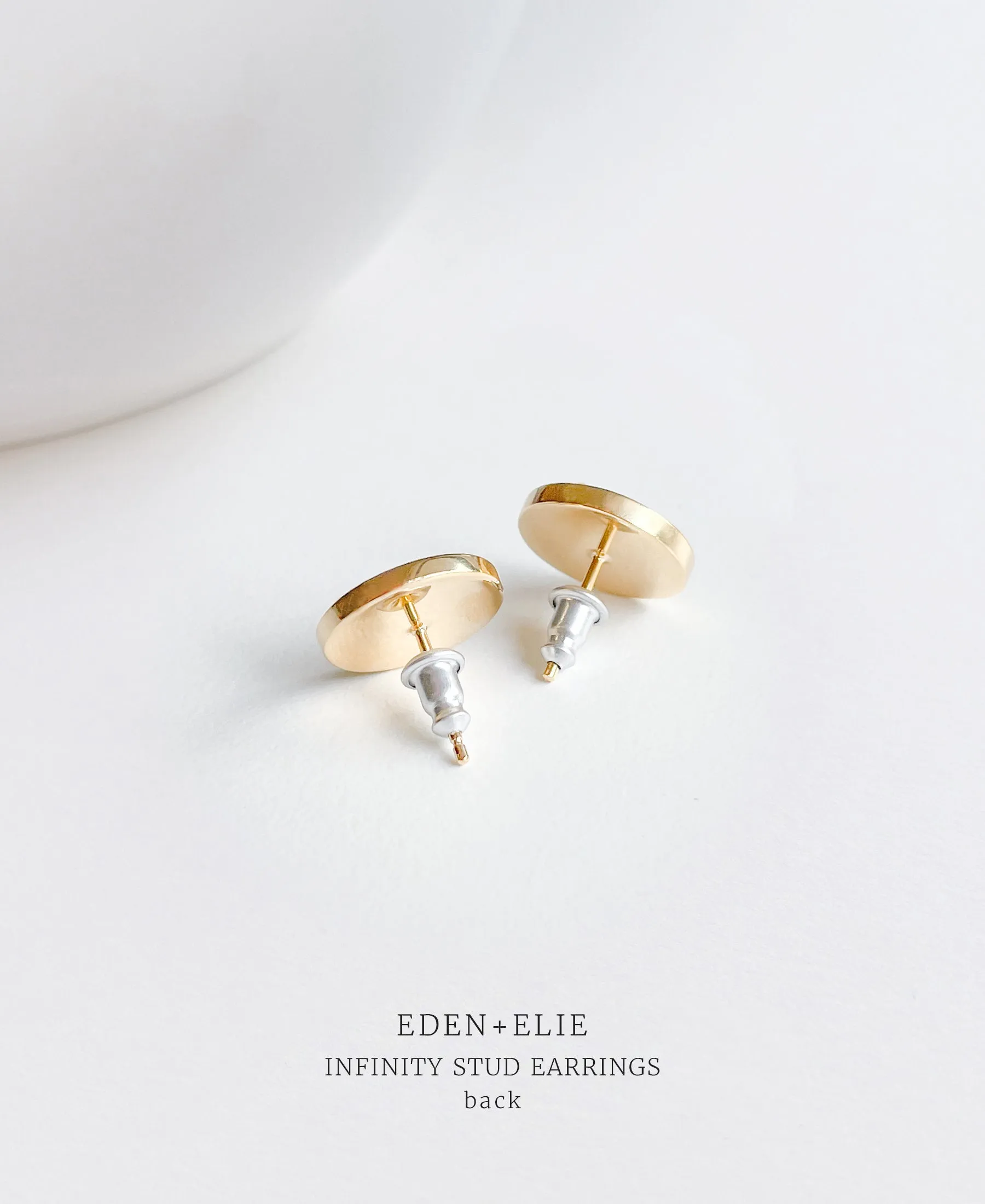 EDEN   ELIE Infinity stud earrings - lagoon